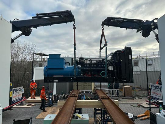 Machine Movers Carrying out a complex 13 ton engine changeover on site using two of our Fassi rear mounted lorry loaders